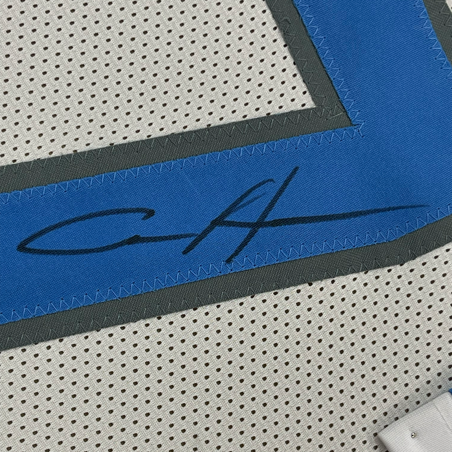 Framed Autographed/Signed Aidan Hutchinson 35x39 Detroit White Football Jersey Beckett BAS COA