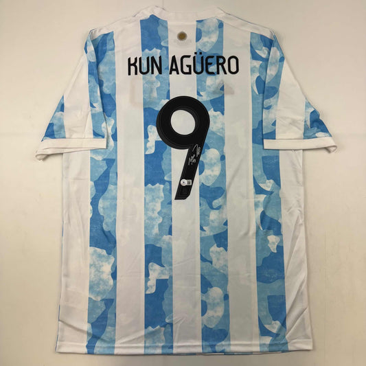 Autographed/Signed Sergio Kun Aguero 2021 Argentina Home Blue Soccer Futbol Jersey Beckett BAS COA