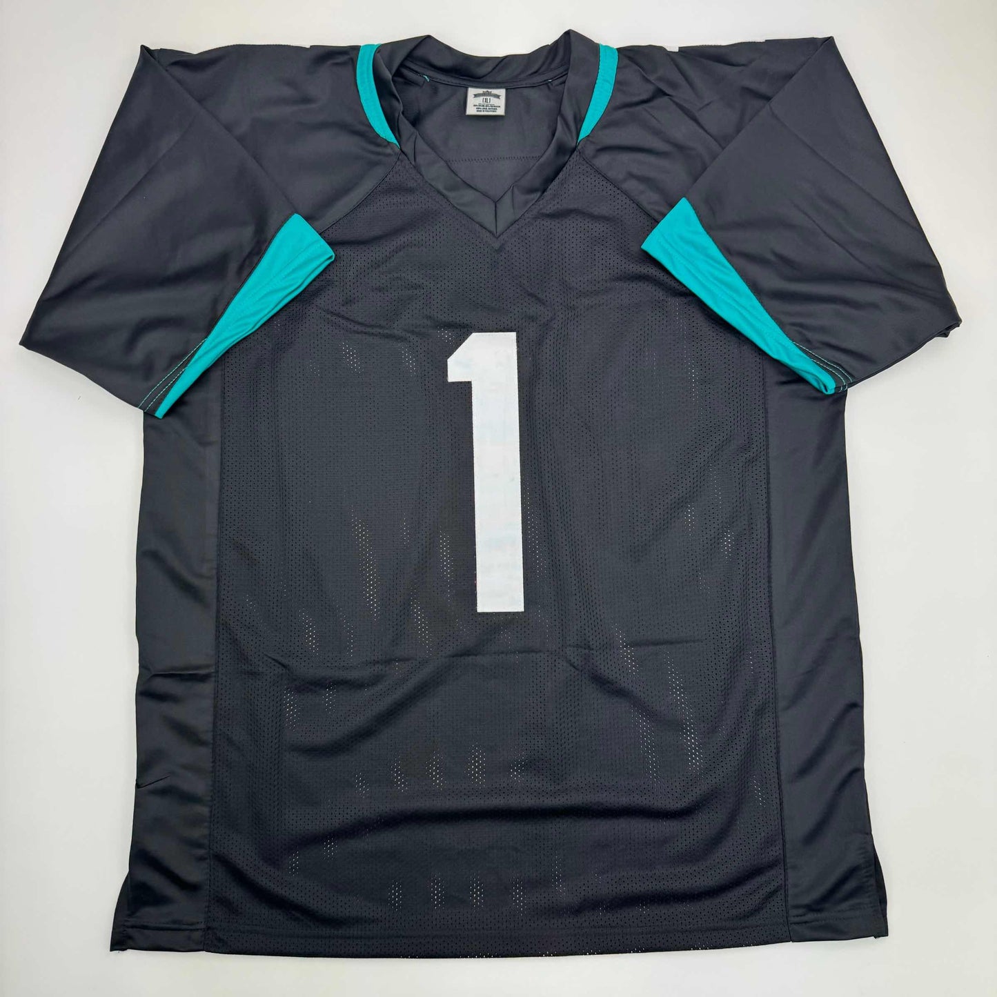 Autographed/Signed Travis Etienne Jr. Jacksonville Black Football Jersey Beckett BAS COA