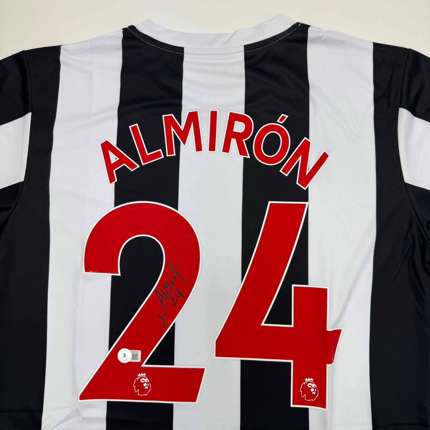 Autographed/Signed Miguel Almiron Newcastle United White/Black Soccer Jersey Beckett BAS COA
