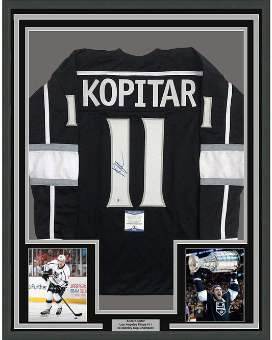 Framed Autographed/Signed Anze Kopitar 35x39 Los Angeles LA Black Hockey Jersey JSA COA