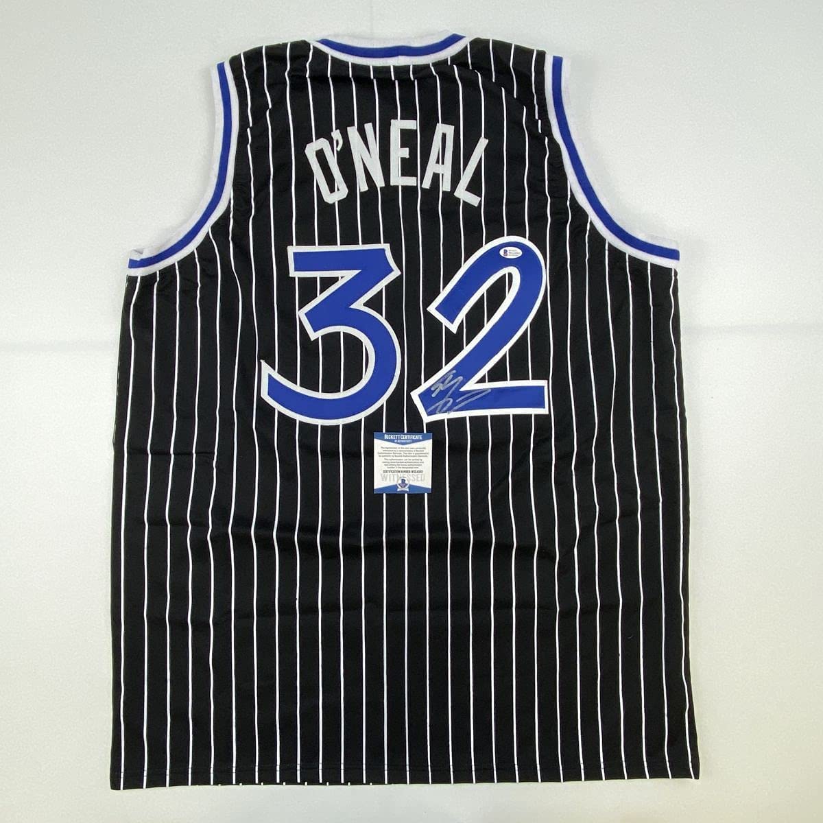 Autographed/Signed Shaquille Shaq O'Neal Orlando Black Pinstripe Basketball Jersey Beckett BAS COA