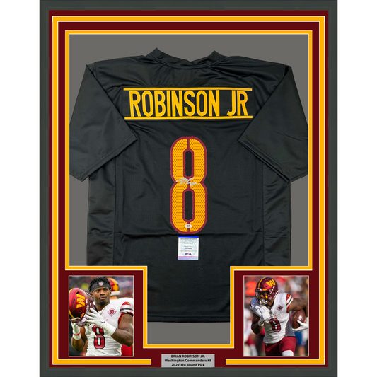 Framed Autographed/Signed Brian Robinson Jr. 35x39 Washington Black Football Jersey PSA/DNA COA