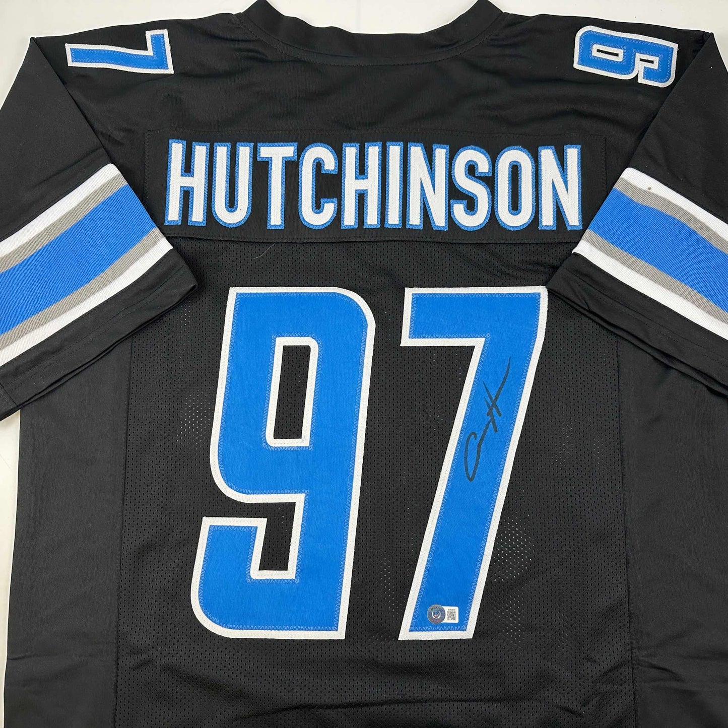 Autographed/Signed Aidan Hutchinson Detroit Black Football Jersey Beckett BAS COA