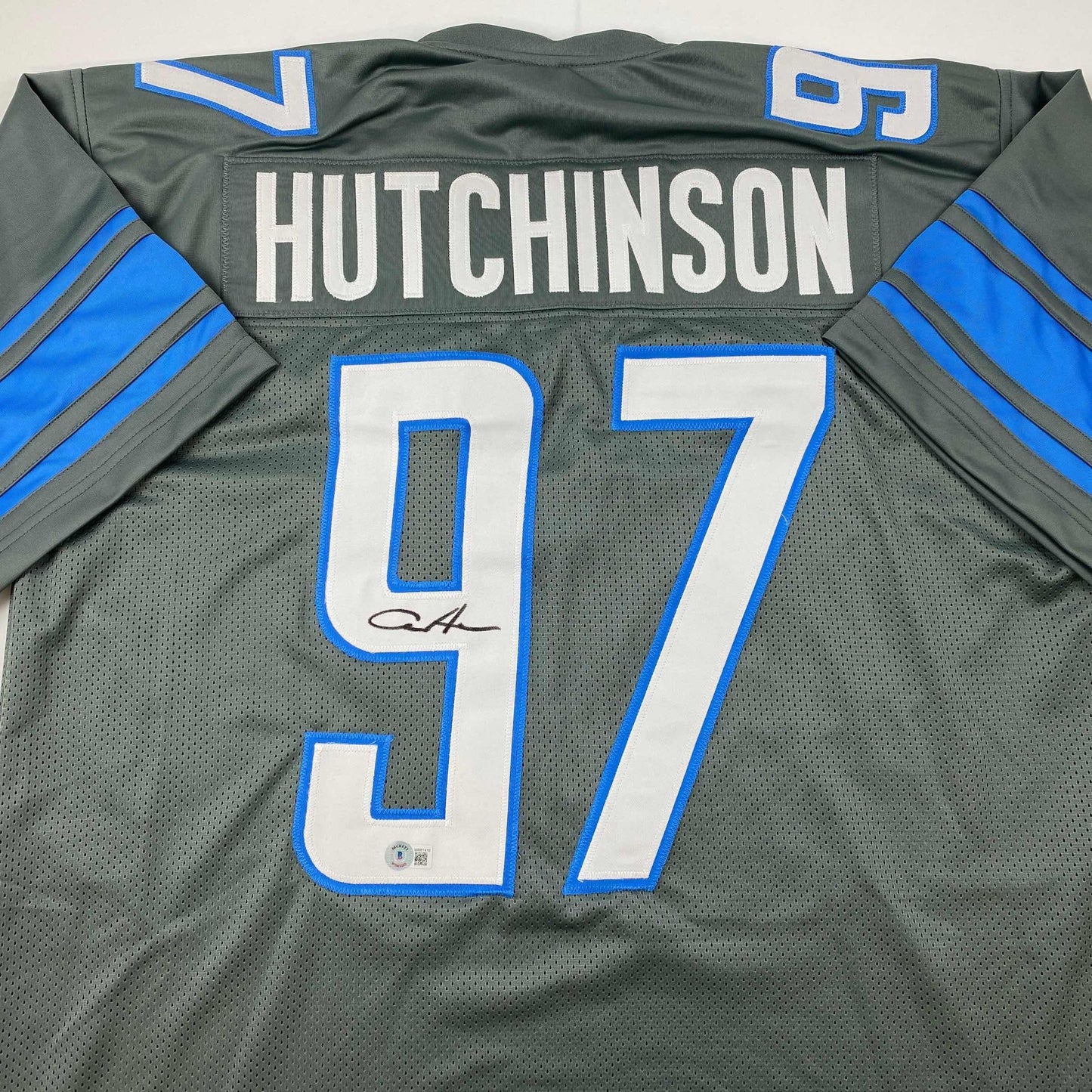 Autographed/Signed Aidan Hutchinson Detroit Grey Football Jersey Beckett BAS COA