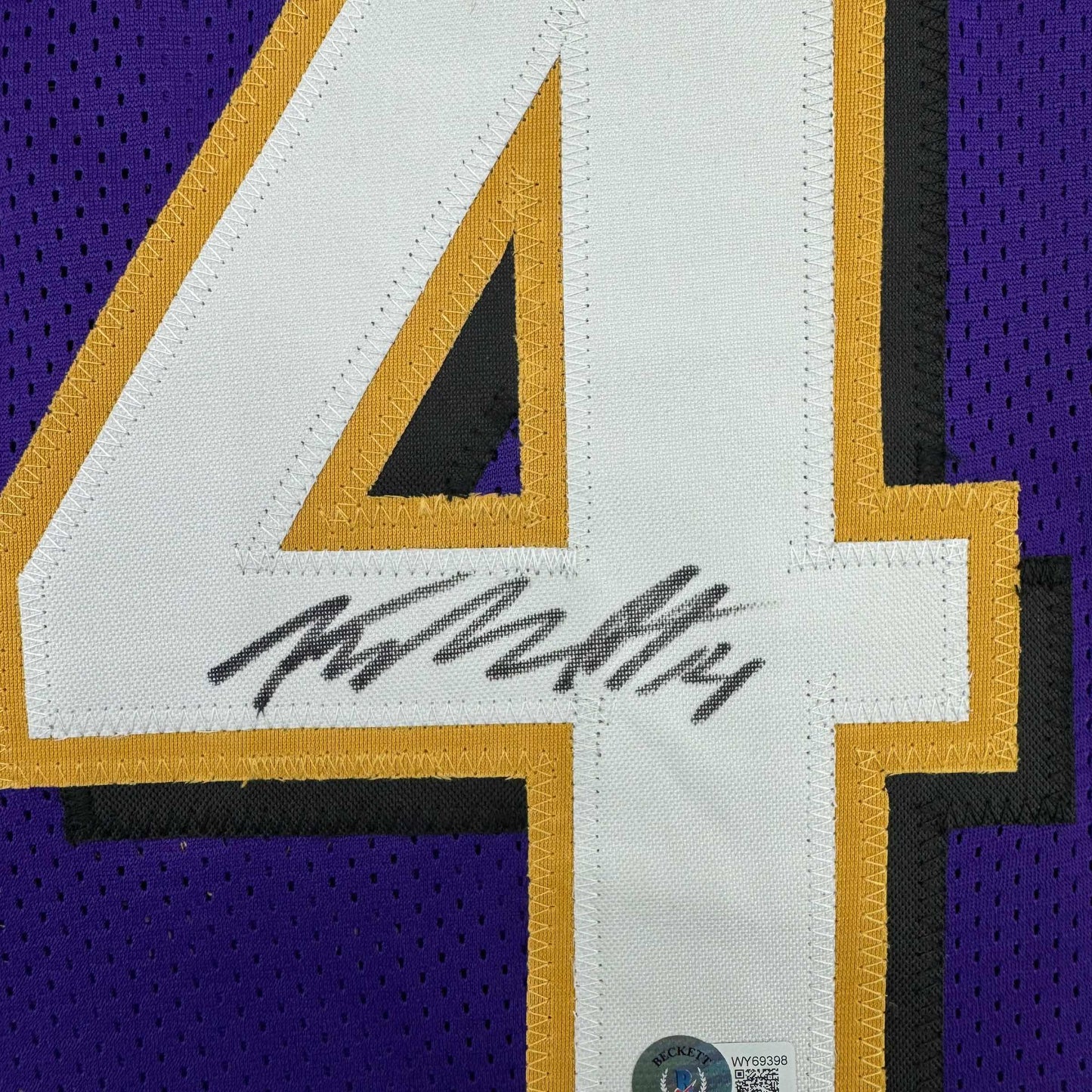Framed Autographed/Signed Kyle Hamilton 35x39 Baltimore Purple Football Jersey Beckett BAS COA