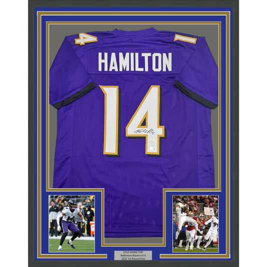Framed Autographed/Signed Kyle Hamilton 35x39 Baltimore Purple Football Jersey Beckett BAS COA