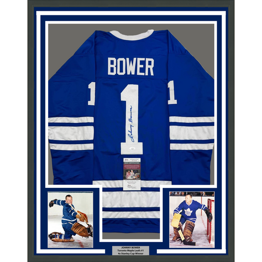 Framed Autographed/Signed Johnny Bower 35x39 Toronto Blue Hockey Jersey JSA COA
