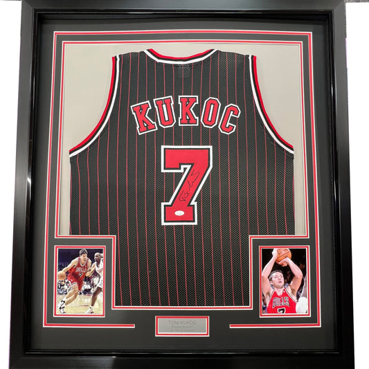 Framed Autographed/Signed Toni Kukoc 35x39 Chicago Black Pinstripe Basketball Jersey Beckett BAS COA
