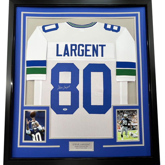 Framed Autographed/Signed Steve Largent 35x39 Seattle White Football Jersey PSA/DNA COA